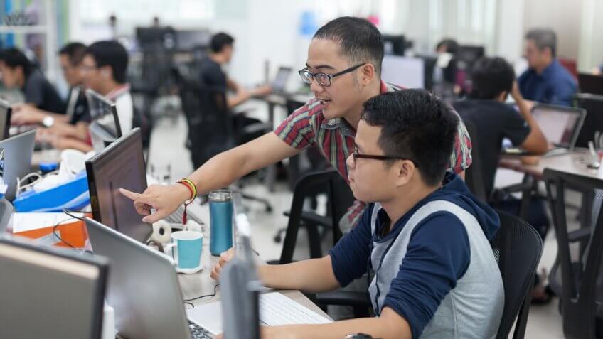 software application developers brainstorming on app