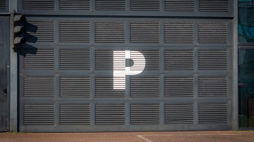 Letter P on Parking entrance.