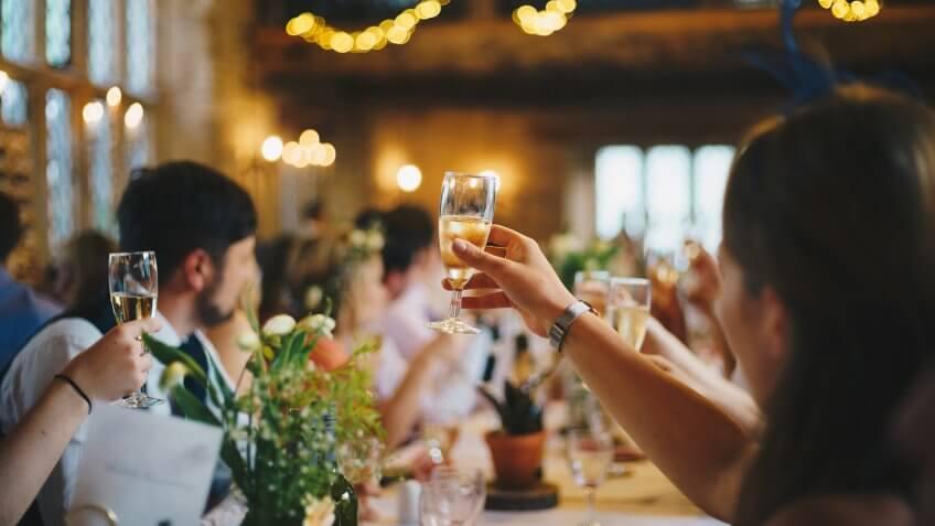 woman cheersing wedding party