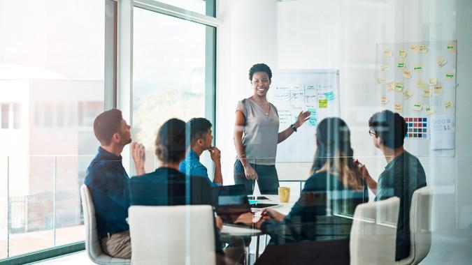 Shot of a group of businesspeople having a meeting in a modern office.