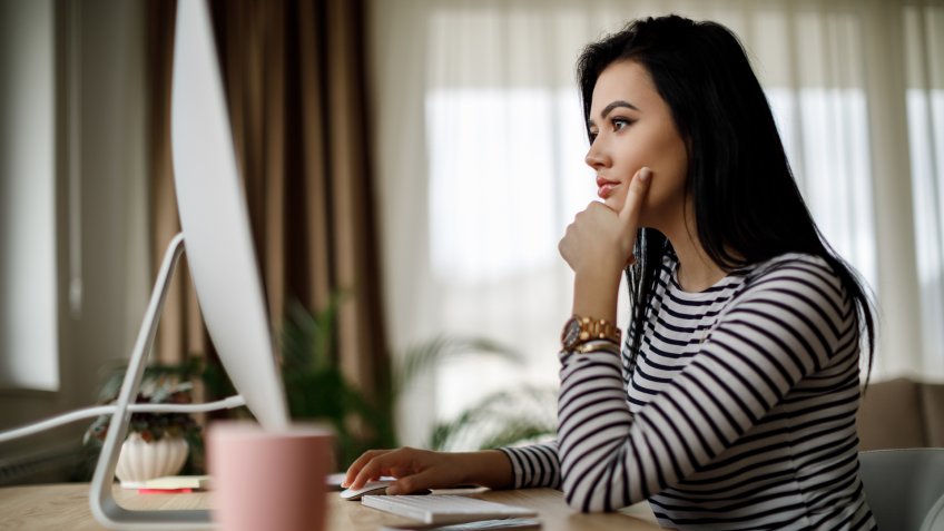Young woman working from home.