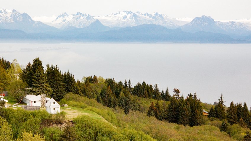 The scenery of Anchor Point with the faraway Katmai National Park and Preserve on the background along the Sterling highway to Homer in Alaska.