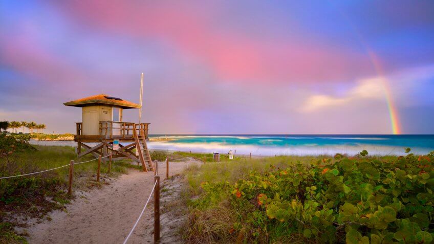 Beautiful Sunset with rainbow at Boca Raton beach, Florida - Image.