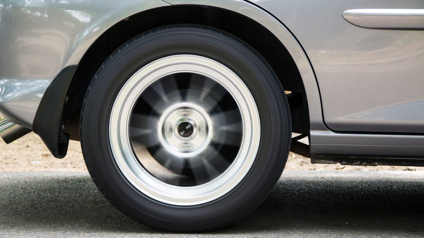 The wheel spinning on concrete.