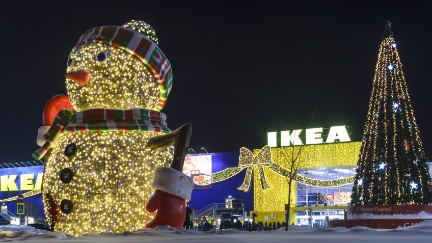 Novosibirsk, Russia - December 17, 2016: new year's decoration of shop "IKEA" on the big snowman of the bulbs and Christmas tree with garlands at the entrance to Novosibirsk 17 Dec 2016.