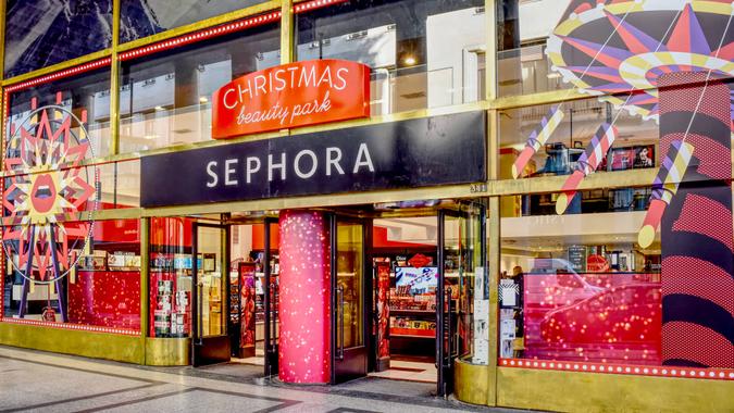 TURIN, ITALY, CIRCA DECEMBER 2017: the red and golden Christmas window shop of Sephora, a French chain of cosmetics stores and beauty products for women.