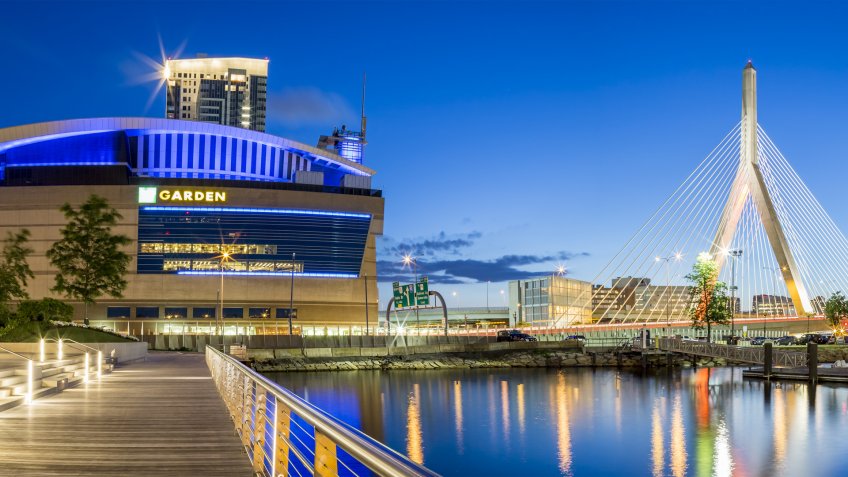 BOSTON, USA - JUNE 20: The architecture of Boston in Massachusetts, USA at night showcasing the Famous Zakim Bridge and the TD Garden stadium at night on June 20, 2017.