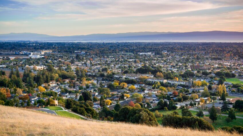 View towards Fremont and Union City from Garin Dry Creek Pioneer Regional Park on a sunny autumn evening, San Francisco bay, California - Image.