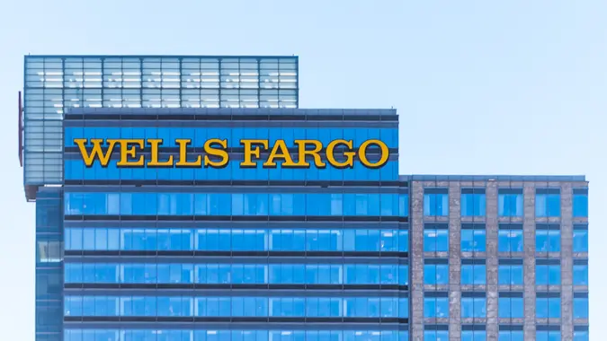 Atlanta, USA - April 20, 2018: Downtown Georgia city skyscrapers during day with modern buildings, business, Wells Fargo Bank closeup.