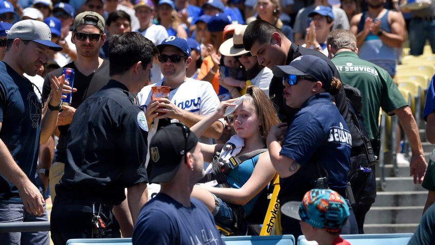 baseball fan gets hit by foul ball
