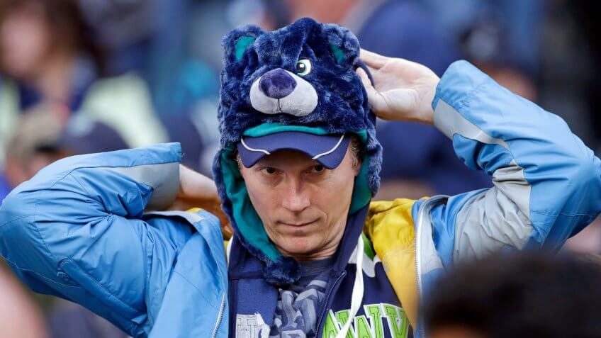 baseball fan wearing Hisashi Iwakuma bear hat from team promotion