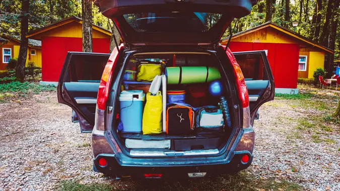 car packed with camping gear