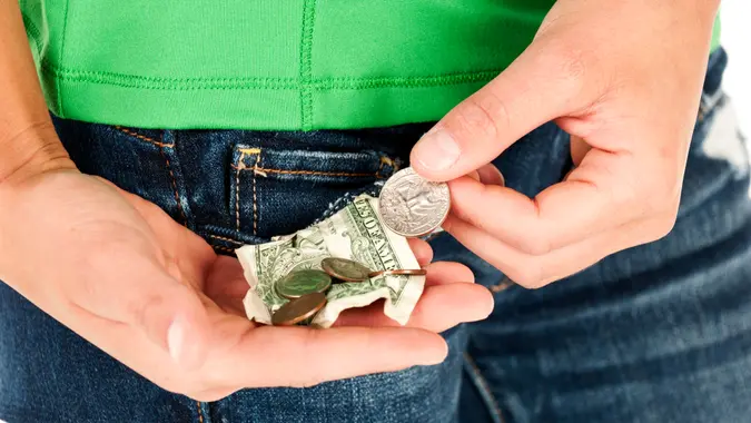 Close up of american money - dollar bill and coins.