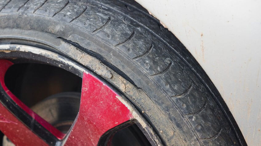 curb rash damage on tire and rim