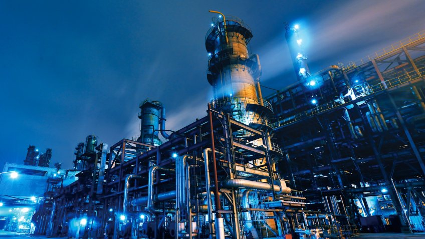 Oil Refinery, Chemical & Petrochemical plant abstract at night.