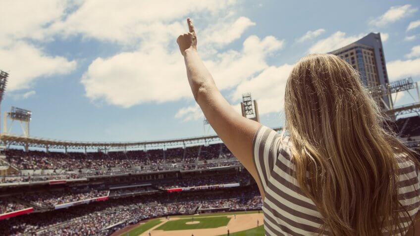 female baseball fan yelling at baseball team