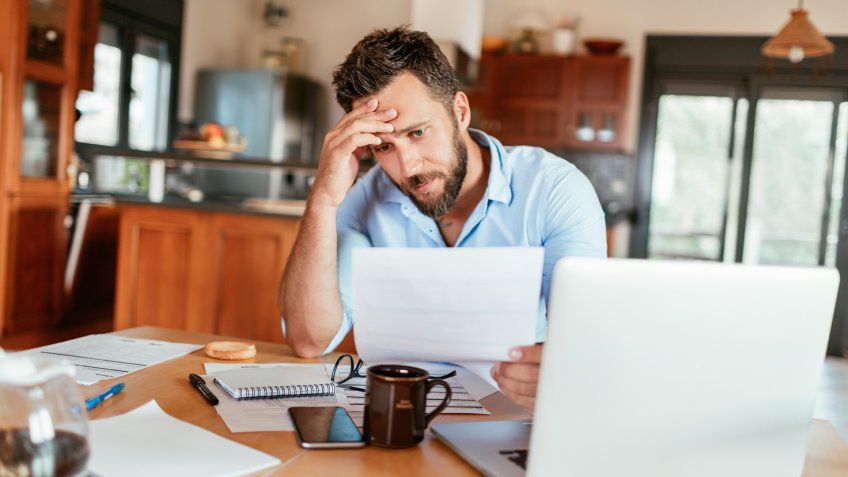 Close up of a man working from home.