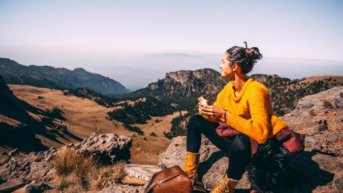 Lunch time. Tired Latin woman making a launch break.