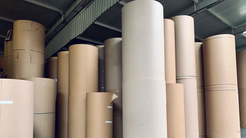 Spools of paper in the generic corrugated board plant.