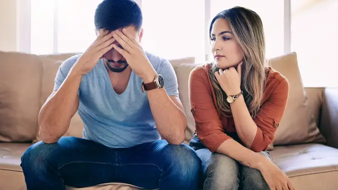 Shot of a young couple having relationship problems at home.
