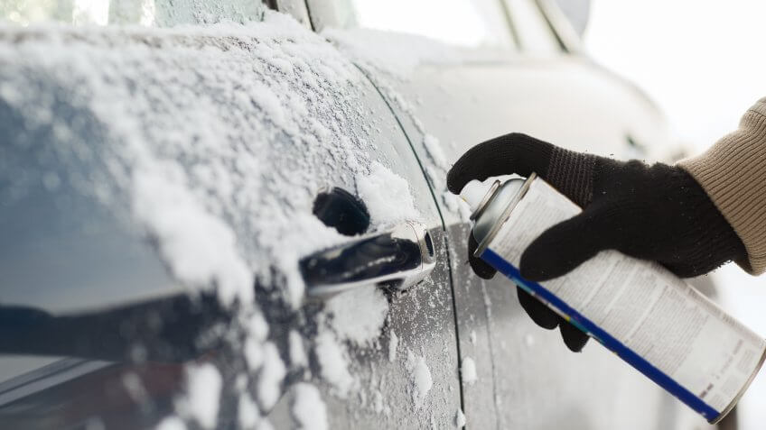 spraying forzen car door lock with WD40