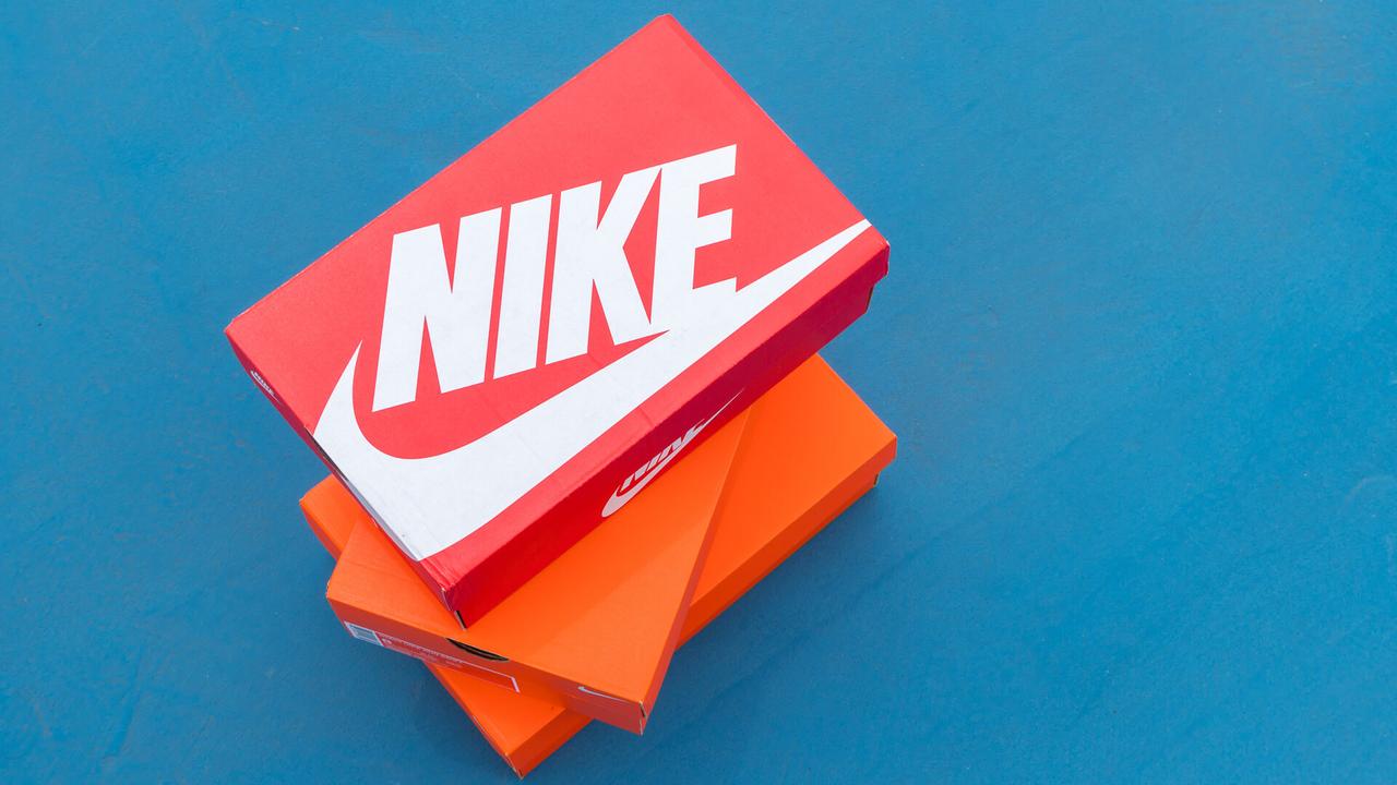 stack of Nike shoes boxes
