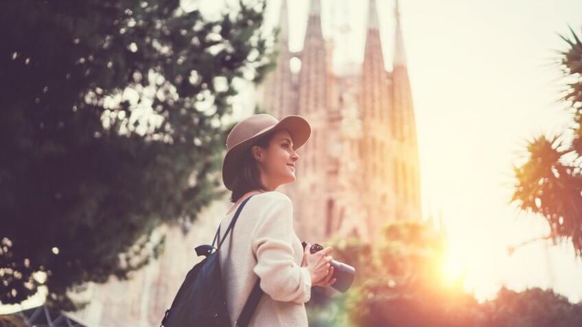 Smiling woman enjoying Barcelona.