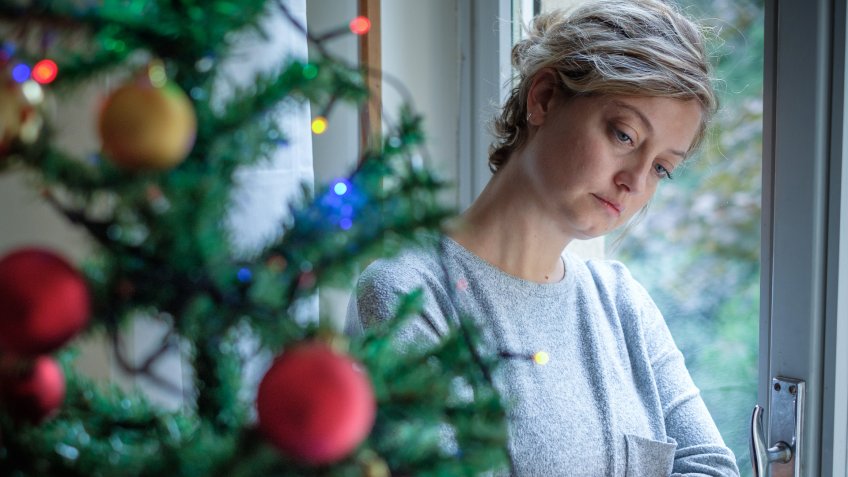 Woman feeling alone during christmas holiday.