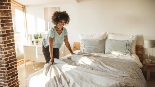 https://cdn.gobankingrates.com/wp-content/uploads/2019/11/woman-making-her-new-bed-iStock-1024724962.jpg?quality=75&w=500&webp=1