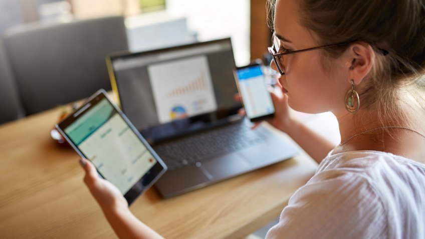 woman price comparing when shopping online