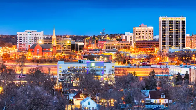 Colorado Springs, Colorado, USA downtown city skyline at dusk.
