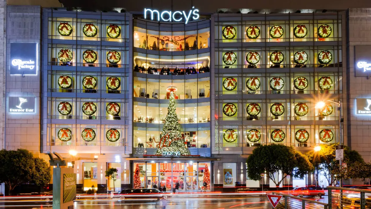 SAN FRANCISCO, CA - NOVEMBER 30: Macy's store illuminated with lights and Christmas tree at Union Square, San Francisco on November 30, 2014 in San Francisco, California.