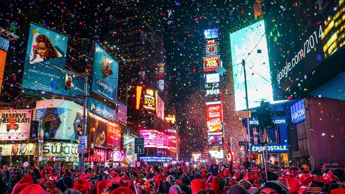 New York City, USA, January 1, 2015, Atmospheric new year's eve celebration on famous times square intersection after midnight with countless happy people enjoying the party - Image.