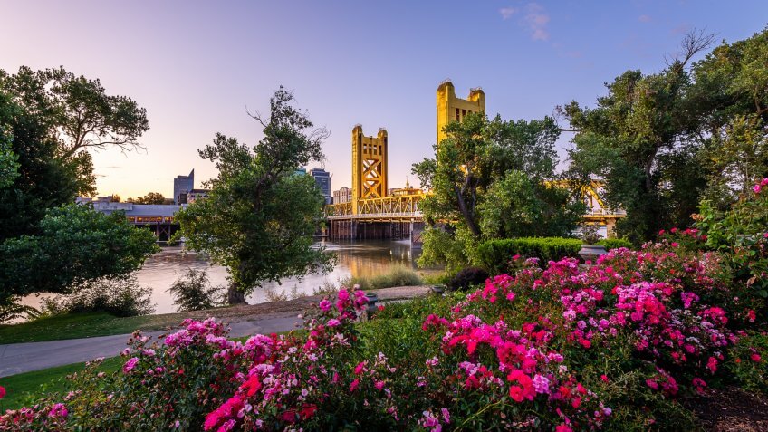 The sun rises over the historical landmarks of West Sacramento, California.