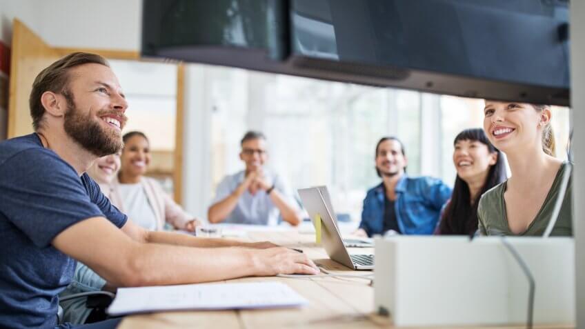 Group of business people in video conference meeting.