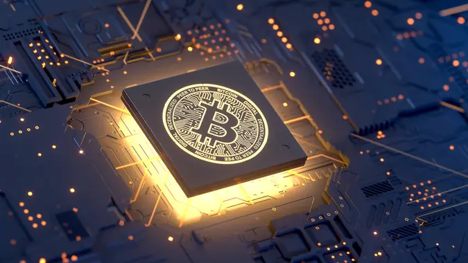 Bitcoin on motherboard,3d rendering,conceptual image.