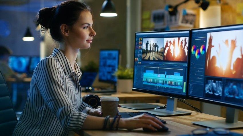 female video editor in studio