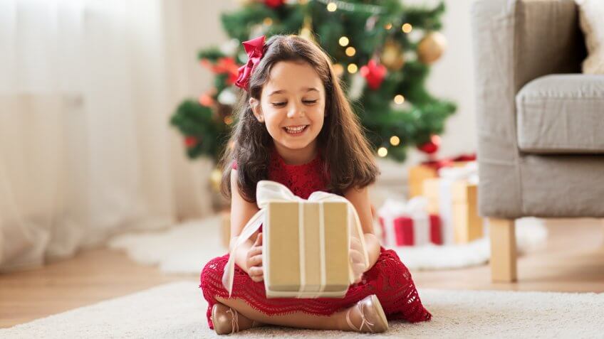 happy girl with christmas present