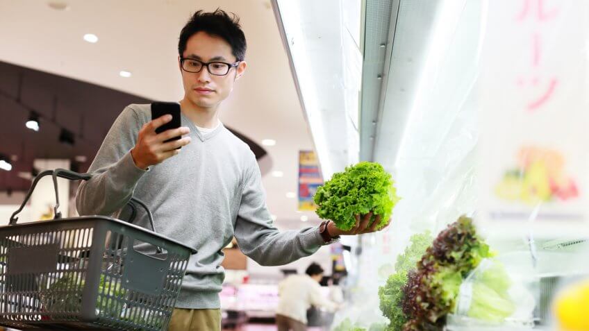 man grocery shopping