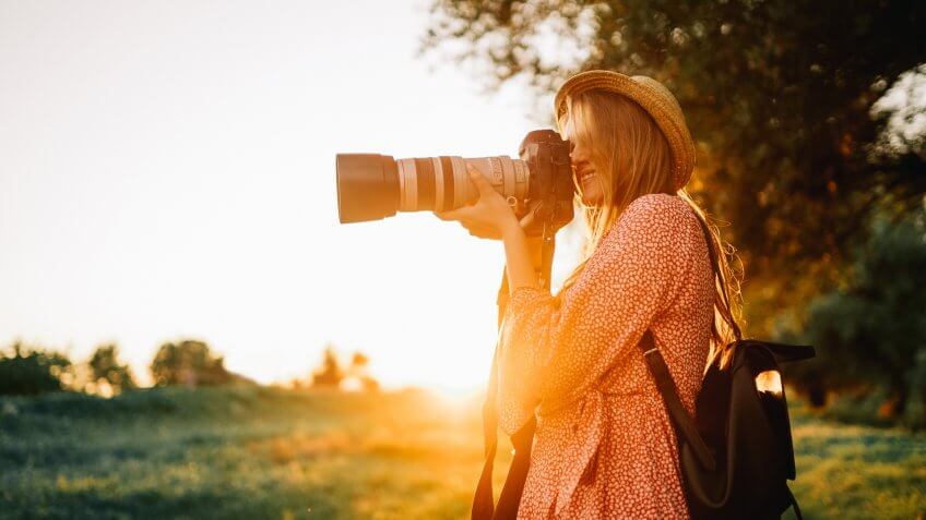 portrait photographer taking photos at sunset