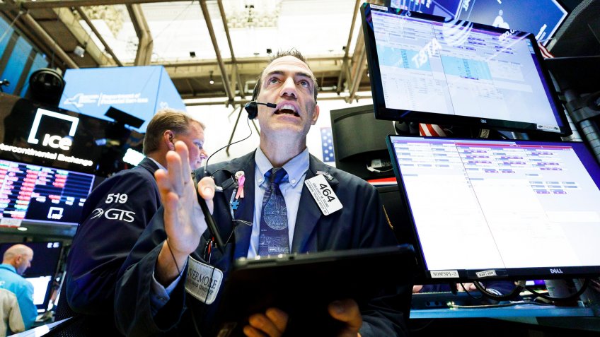 Mandatory Credit: Photo by JUSTIN LANE/EPA-EFE/Shutterstock (10434238d)Traders work on the floor of the New York Stock Exchange in New York, New York, USA, on 02 October 2019.