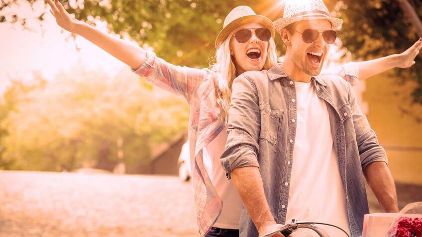couple ridinig bicycle