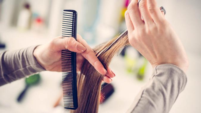 girl getting hair cut