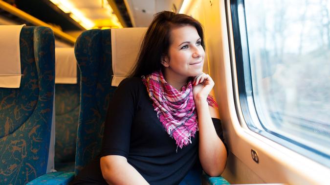 girl riding train