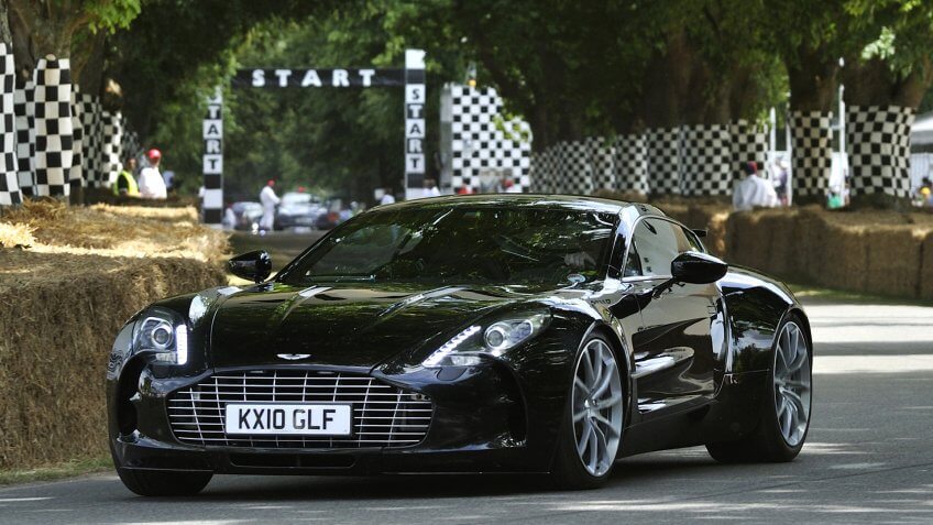 GOODWOOD, UNITED KINGDOM - JULY 3: Aston Martin One 77 drives up the hill at the Goodwood Festival of Speed in the United Kingdom on July 3, 2010 in Goodwood, UK.