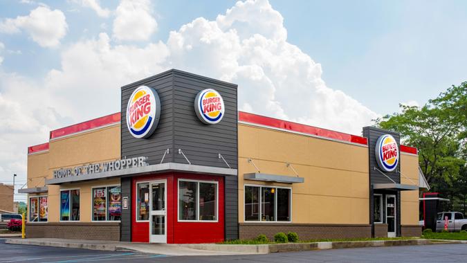 Dayton, Ohio, USA - May 29, 2016: The newest Burger King "20/20" restaurant design with a sleek, contemporary, futuristic industrial-look theme includes brick cladding, manicured landscaping and a covered drive-thru order point with digital order screens.