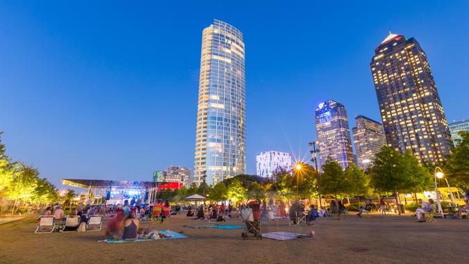 May 1, 2015 Dallas, TX USA: People are relaxing and picnicking in free music in the park event in Klyde Warren Park, uptown Dallas, TX.