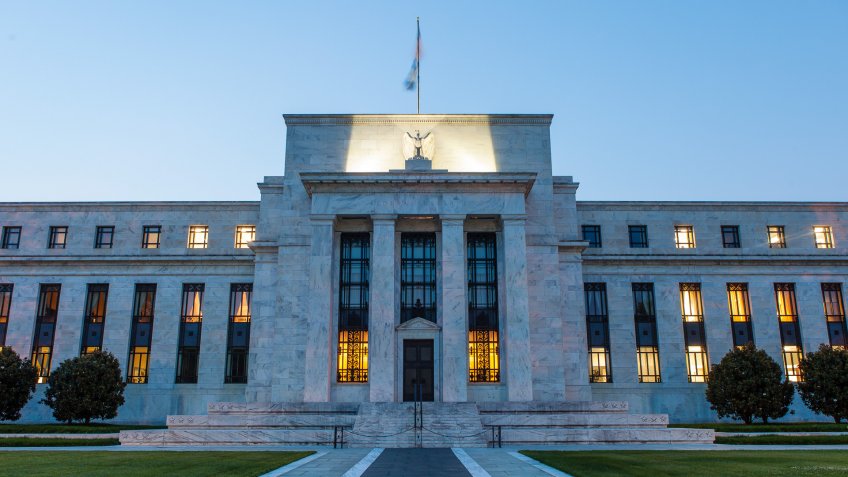The Federal Reserve Building in downtown Washington DC, USA at night.