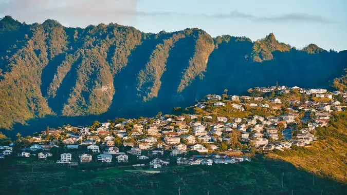 Kaneohe town and mountain range at sunset, Hawaii, USA.