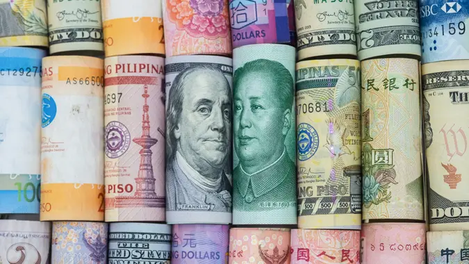 US dollar and China Yuan banknote  with multi countries banknotes.